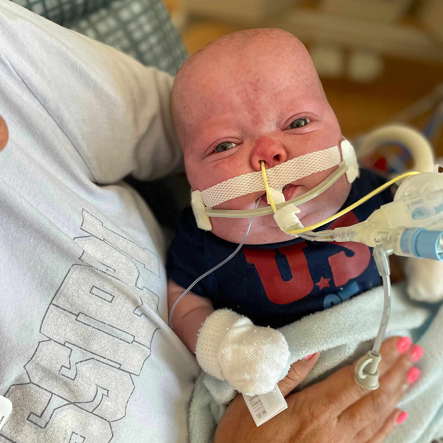 Reece is registered to the contest to win money with this photo: architecture, baby, bodypart, building, childbirth, clothing, couch, cushion, face, finger, furniture, hand, head, homedecor, hospital, newborn, person, photography, portrait, smokepipe