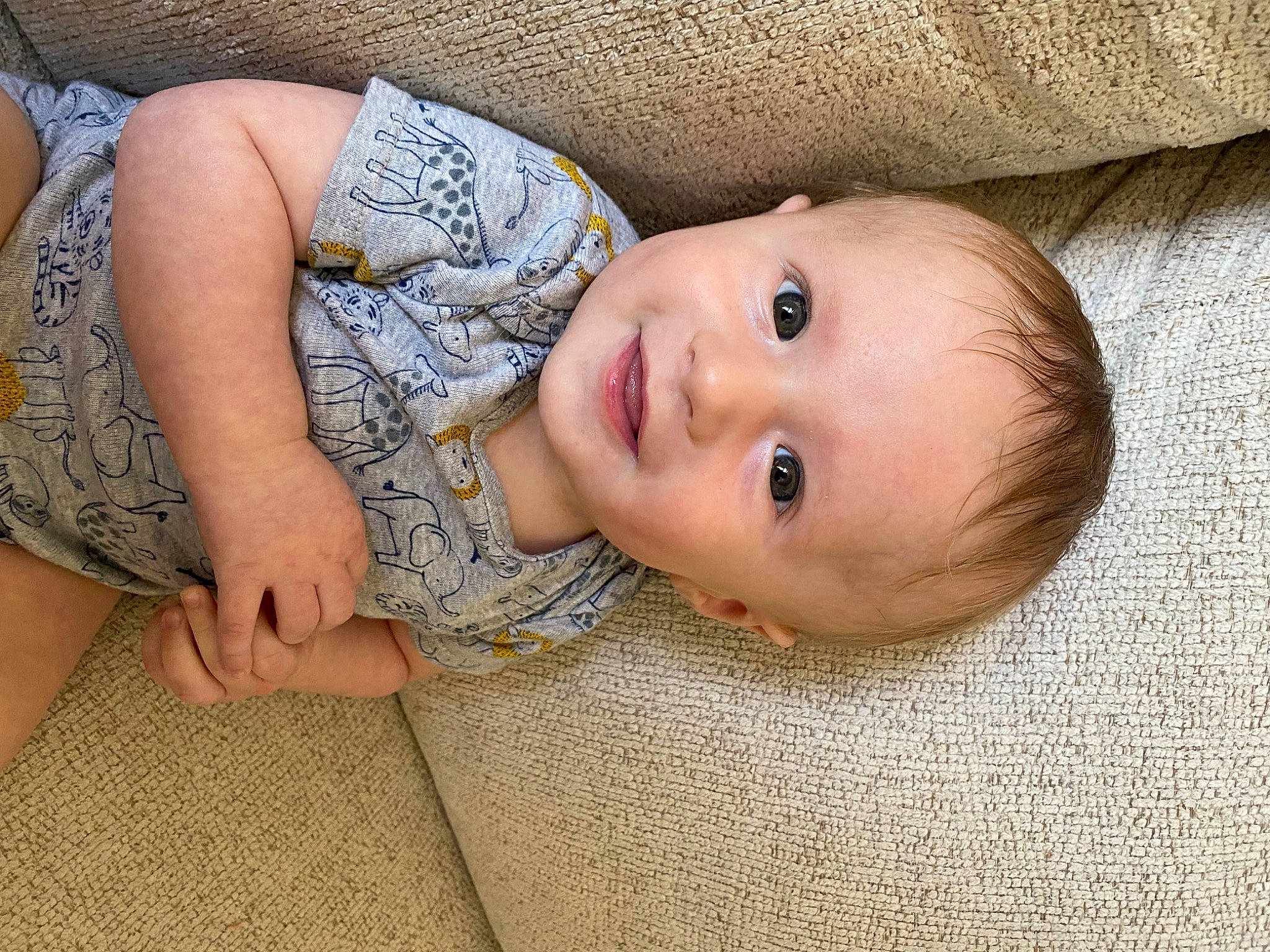 Max joined the competition — help win amazing prizes! baby, baby_toddler_clothing, cheek, child, comfort, eyelash, flooring, grass, happy, head, human_body, human_leg, iris, joy, lip, nose, pattern, person, skin, smile