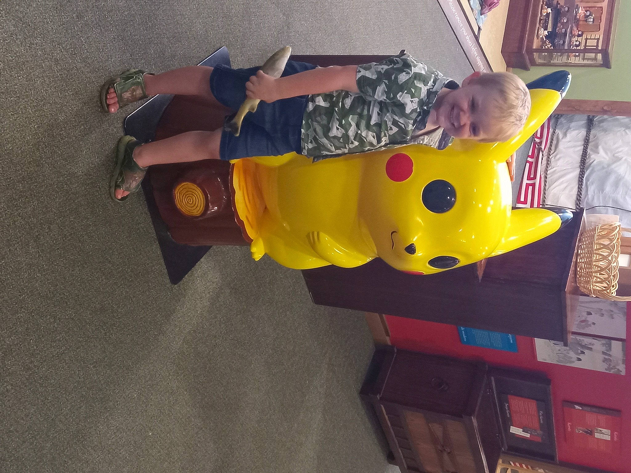 Gage is registered to the contest to win money with this photo: baby_toddler_clothing, fun, happy, joy, person, picture_frame, play, recreation, room, t_shirt, toddler, walking_shoe