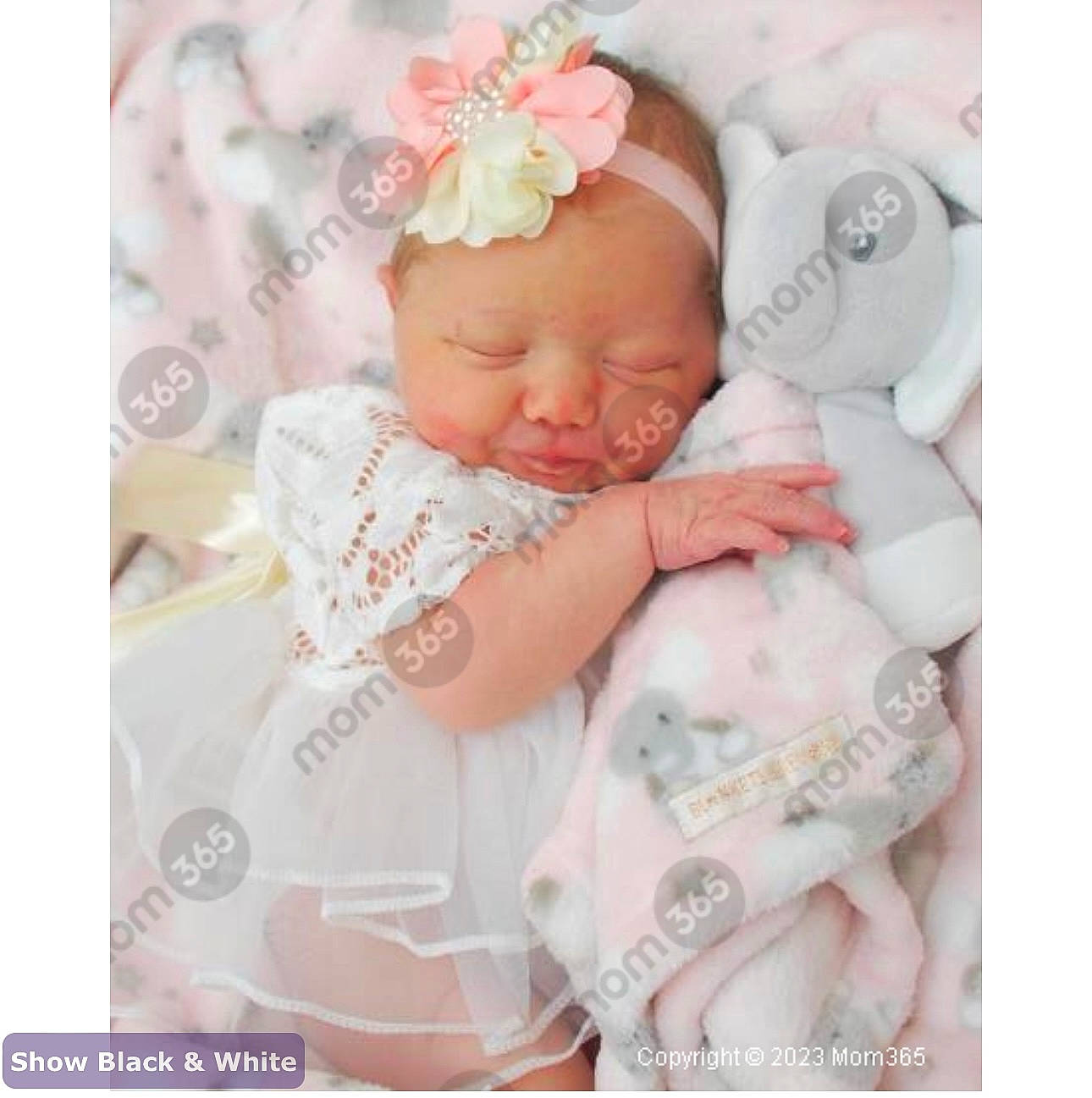 Aaliyah joined the competition — help win amazing prizes! baby, baby_products, baby_sleeping, baby_toddler_clothing, cheek, child, comfort, fashion_accessory, flower, happy, headwear, iris, linens, pattern, peach, person, petal, pink, product, sitting