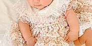 Hattie-Bloom is registered to the contest to win money with this photo: baby, infant, dress, headband, flower, lace, cute, soft, white, fabric, socks, child, portrait, adorable, delicate, pink, skin, hands, legs, sitting