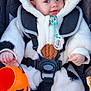 baby, child, costume, cow, halloween, pumpkin, bucket, car_seat, straps, cute, smiling, blue_eyes, hood, plush, hand, outdoor, seasonal, holiday, festive, infant