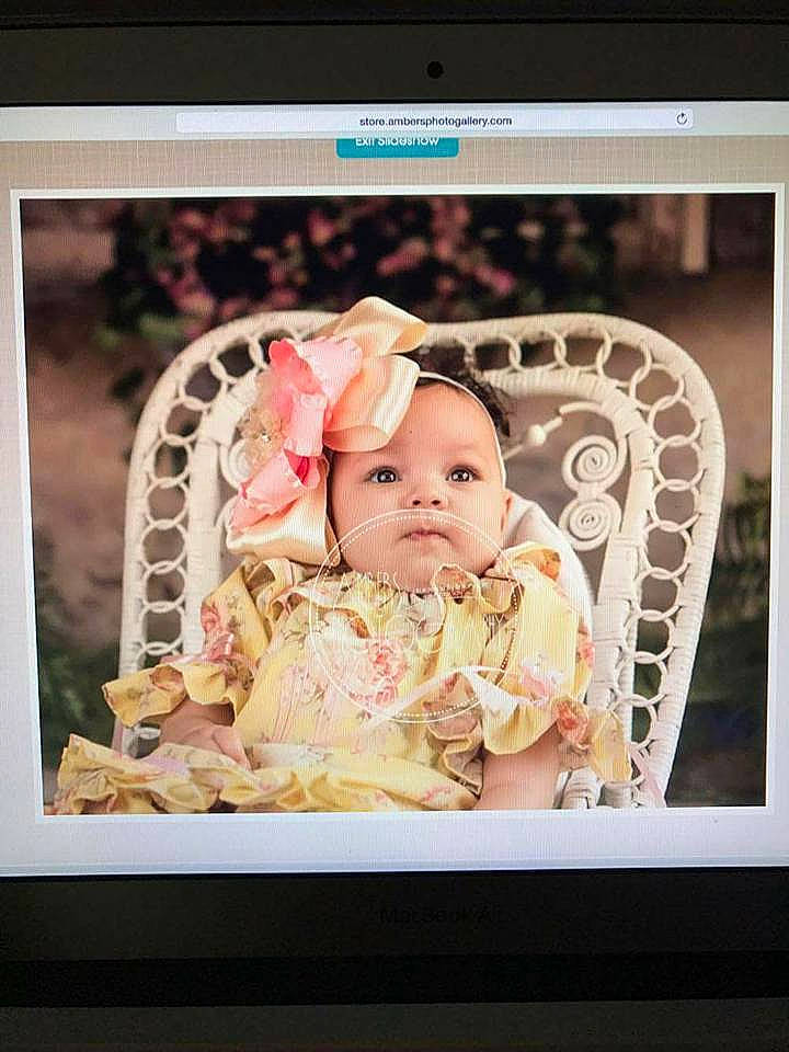 Whitley is registered to the contest to win money with this photo: child, hair_accessory, infant, person, photograph, picture_frame, pink, product, toddler