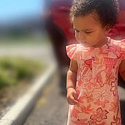 Makaya joined the competition — help win amazing prizes! car, casual_wear, child, curious, curly_hair, cute, daylight, exploring, floral_pattern, outdoor, pavement, person, pink_clothing, portrait, romper, sidewalk, standing, sunlight, toddler, young_child