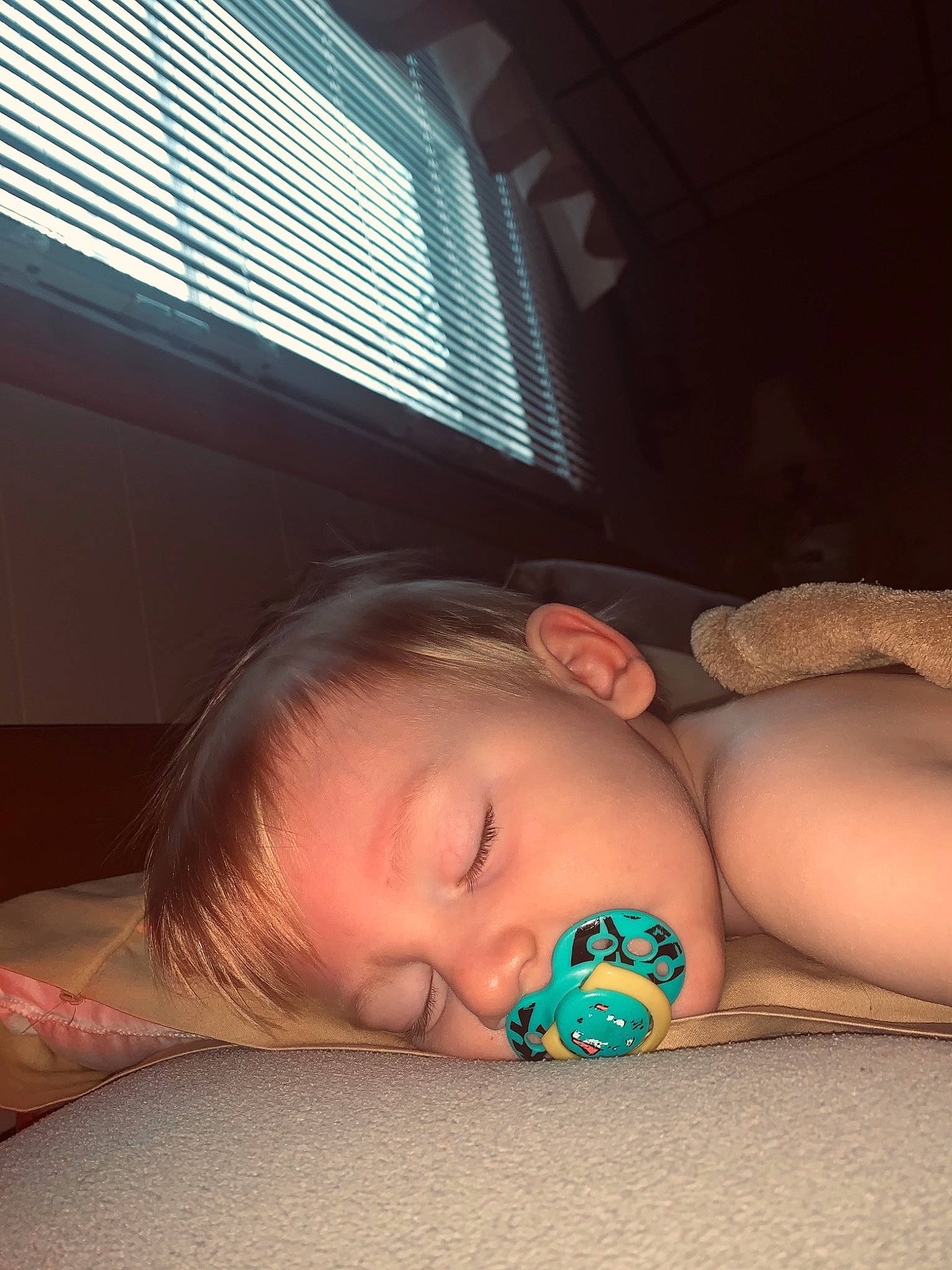 Westley is registered to the contest to win money with this photo: baby, beauty, cheek, child, comfort, elbow, eyelash, flash_photography, flooring, human_leg, mouth, neck, nose, organ, person, room, skin, tints_and_shades, toddler, window_blind