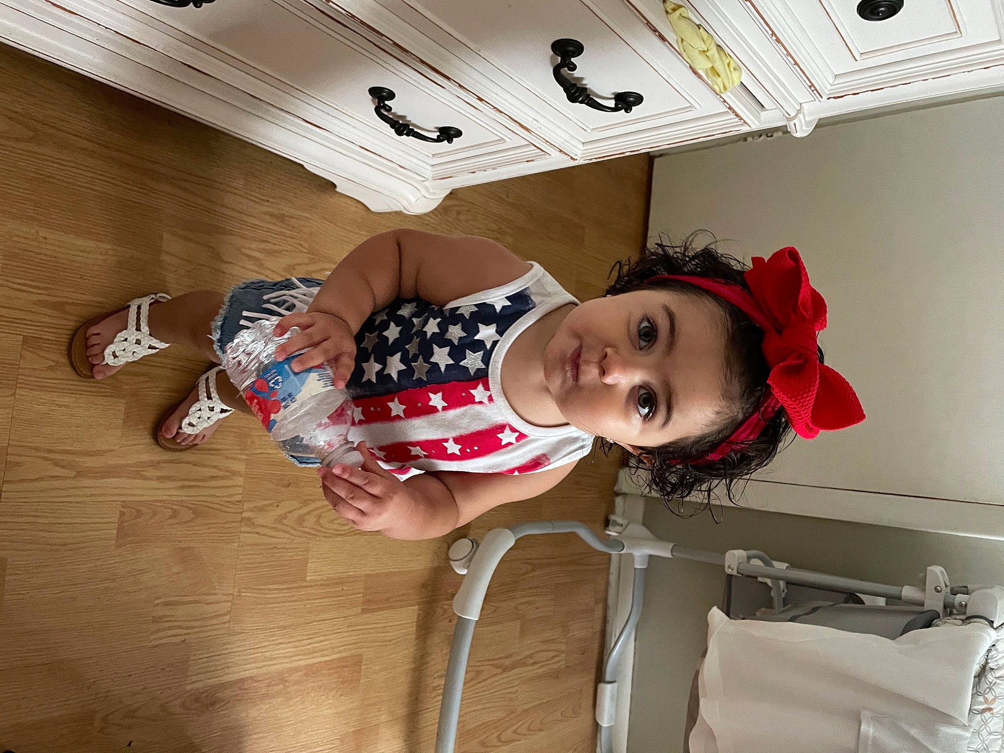 Azariah joined the competition — help win amazing prizes! baby, baby_products, baby_toddler_clothing, carmine, child, comfort, costume, flesh, flooring, fun, happy, hardwood, hat, headgear, person, plastic_bag, room, surprise, toddler, visual_arts