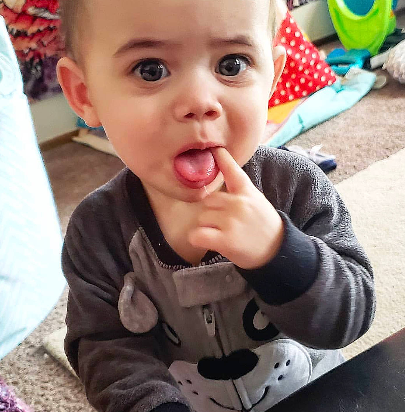 Raedyn is registered to the contest to win money with this photo: cheek, child, ear, finger, infant, lip, mouth, nose, person, product, surprise, toddler, tongue