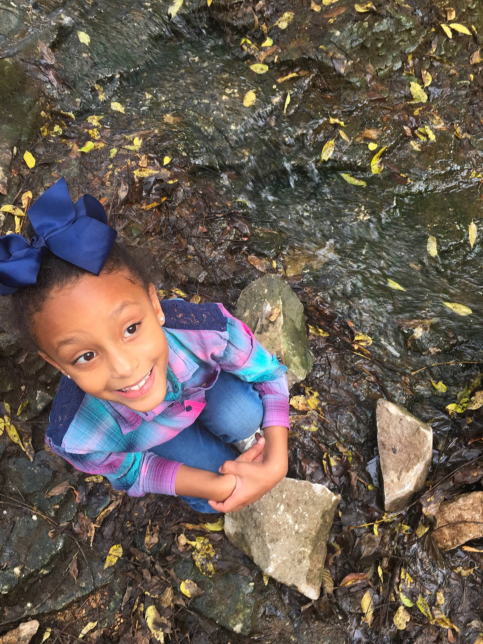 Aubrey. Aliaona joined the competition — help win amazing prizes! adventure, asphalt, bedrock, child, electric_blue, fun, grass, happy, joy, landscape, leisure, people_in_nature, person, plastic, recreation, rock, shadow, sitting, smile, soil