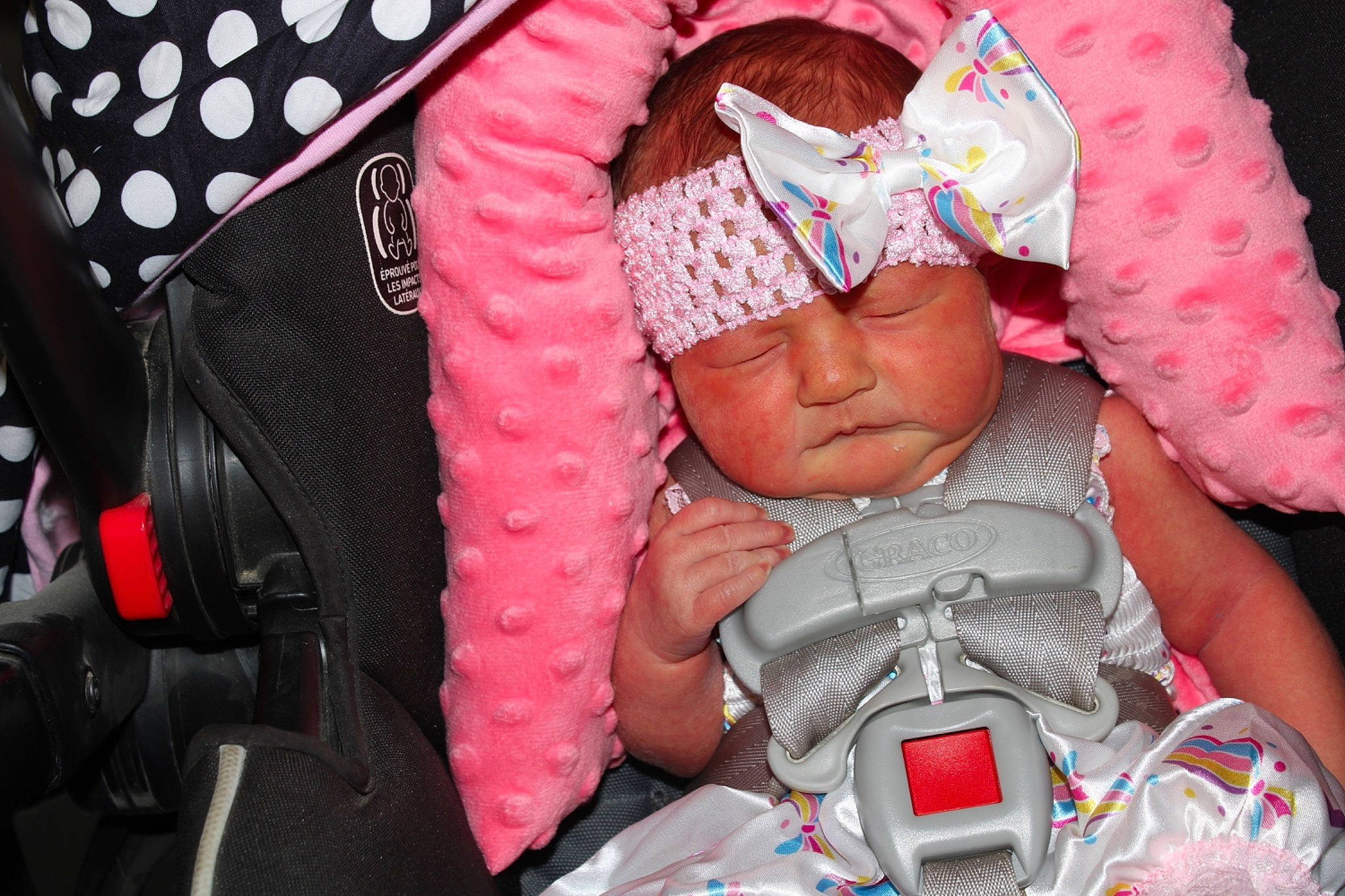 Cecilia is registered to the contest to win money with this photo: baby, baby_carriage, baby_products, baby_toddler_clothing, bag, beauty, cap, car_seat, child, cool, eye, happy, headwear, magenta, pattern, person, personal_protective_equipment, pink, product, sleeve