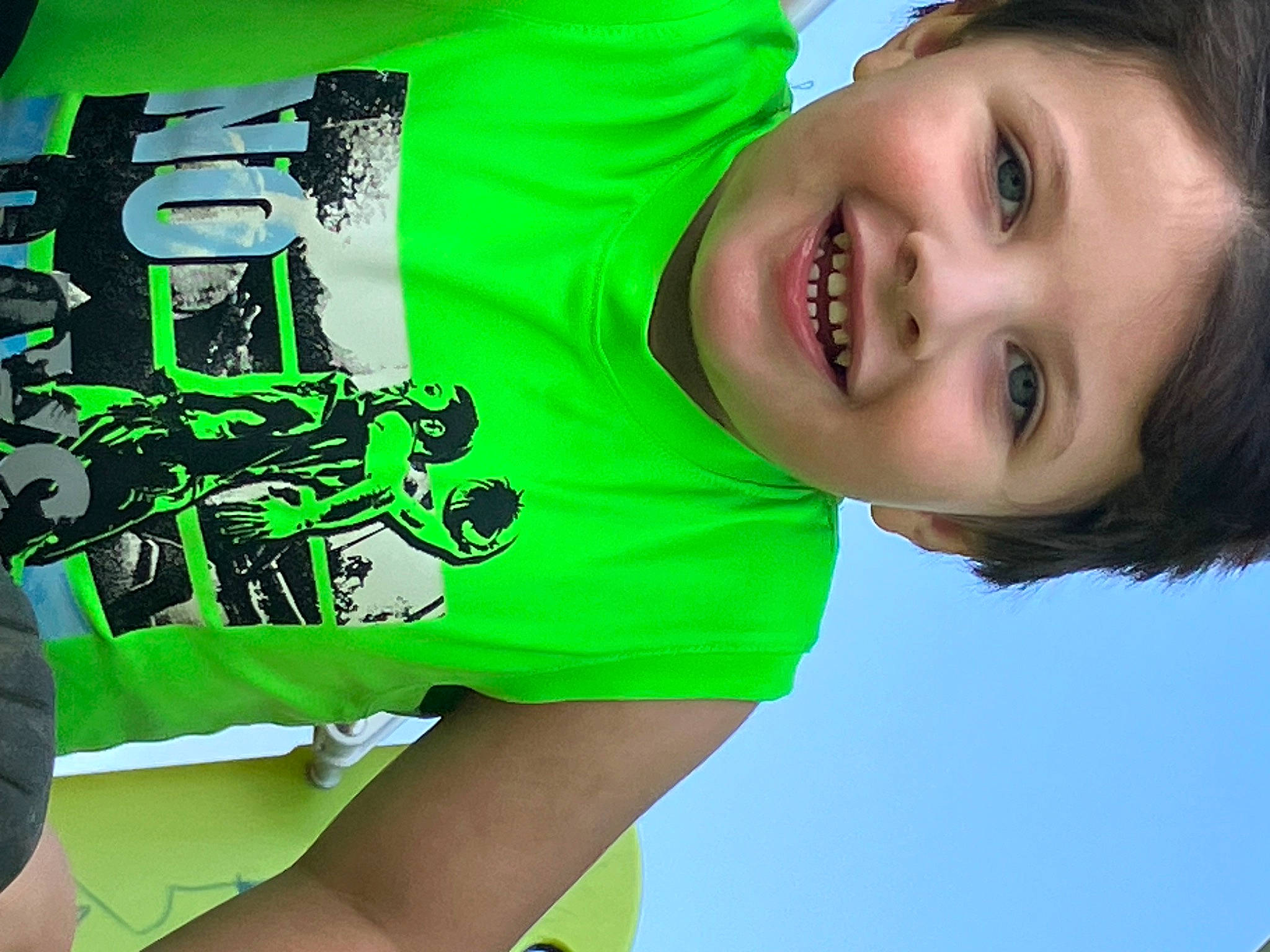 Xander joined the competition — help win amazing prizes! active_shirt, brand, child, cool, elbow, fashion, font, fun, grass, green, happy, joy, laugh, leisure, light, person, sleeve, smile, sportswear, t_shirt