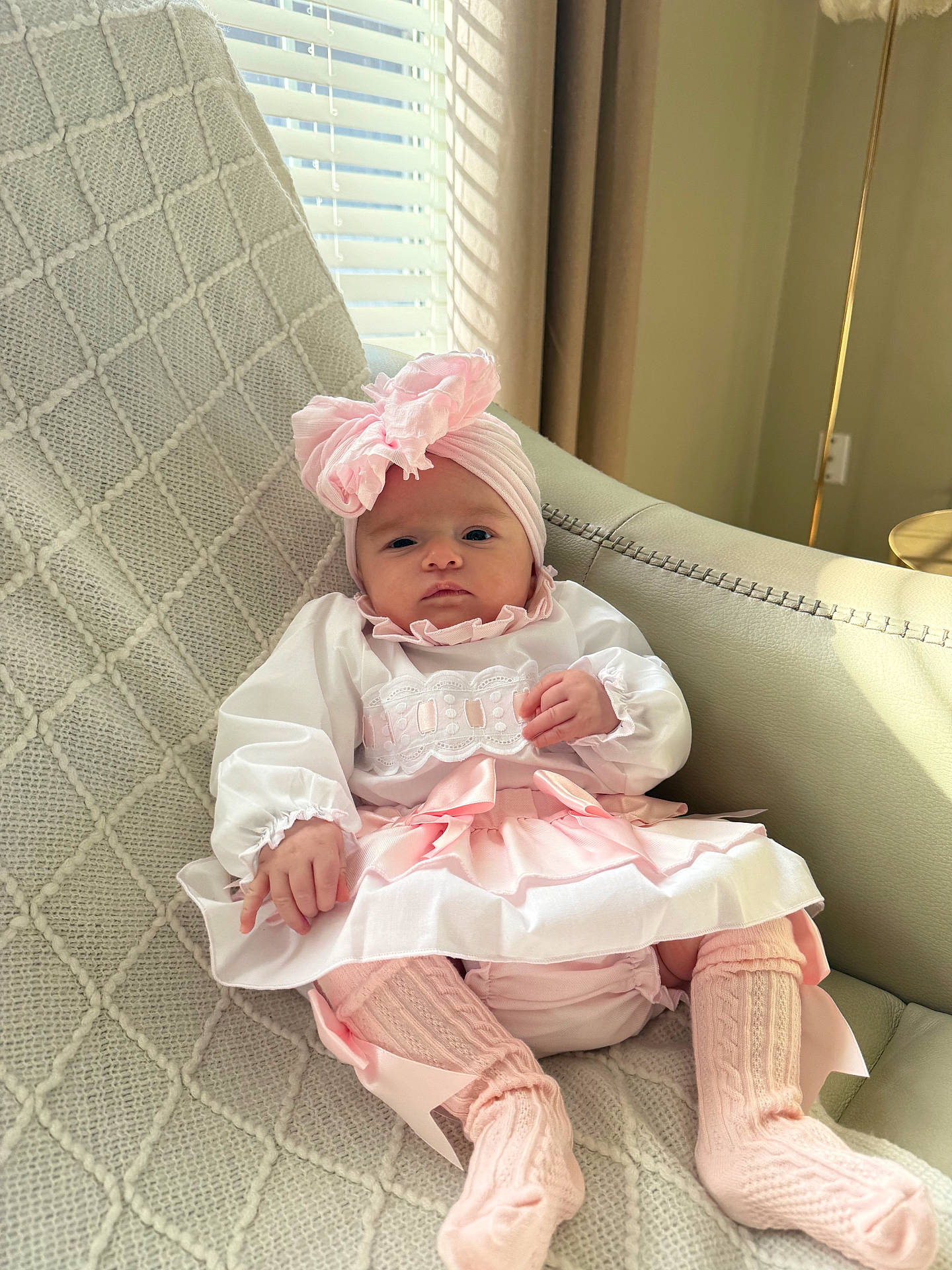 Elys joined the competition — help win amazing prizes! armchair, baby, blanket, child, cute, fabric, headband, home, indoors, infant, natural_light, person, pink_clothing, portrait, relaxing, seated, socks, soft_light, texture, window_blinds