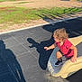 Armani joined the competition — help win amazing prizes! black_shorts, blue_sky, child, daylight, grass, outdoor, park, person, playground, playing, red_shirt, rubber_floor, shadow, slide, small_slide, sneakers, summer, sunny, toddler, trees