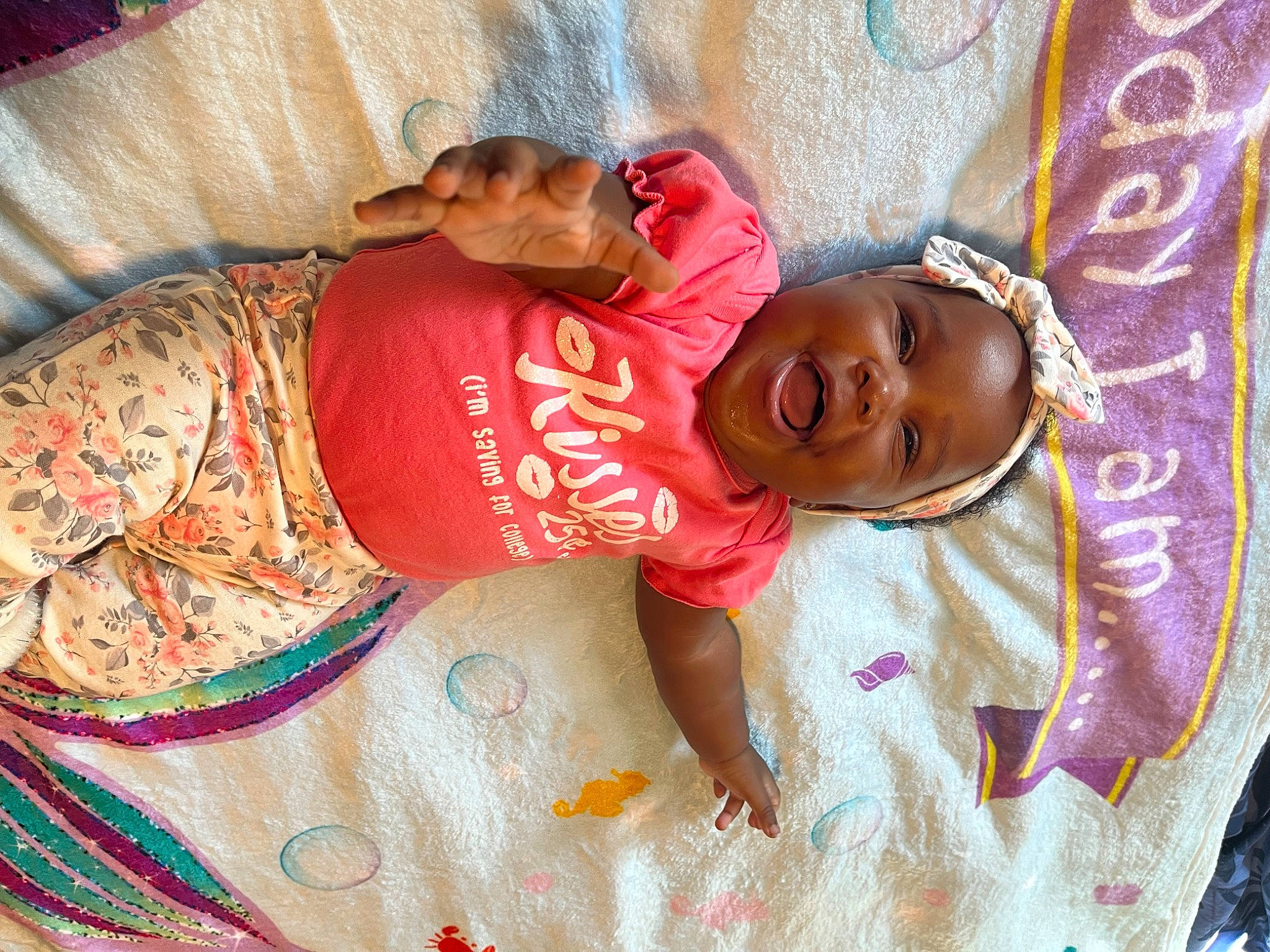 Alani joined the competition — help win amazing prizes! arm, baby, child, comfort, fun, hand, happy, human_body, linens, magenta, pattern, person, pink, room, sari, skin, smile, t_shirt, temple, textile