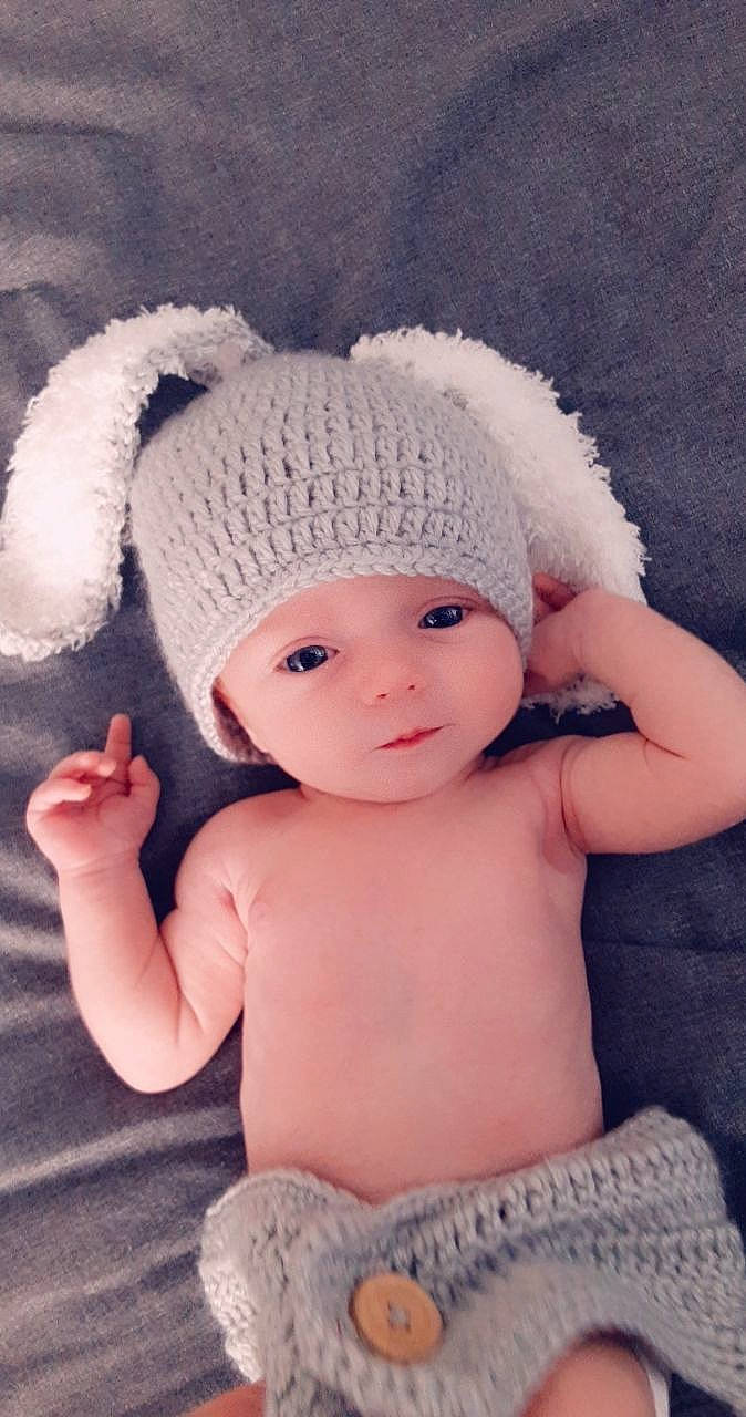 Jaylynn joined the competition — help win amazing prizes! baby, baby_sleeping, baby_toddler_clothing, cap, child, eye, finger, hair_accessory, head, headgear, headwear, knit_cap, lip, nail, person, pink, skin, textile, thumb, toddler