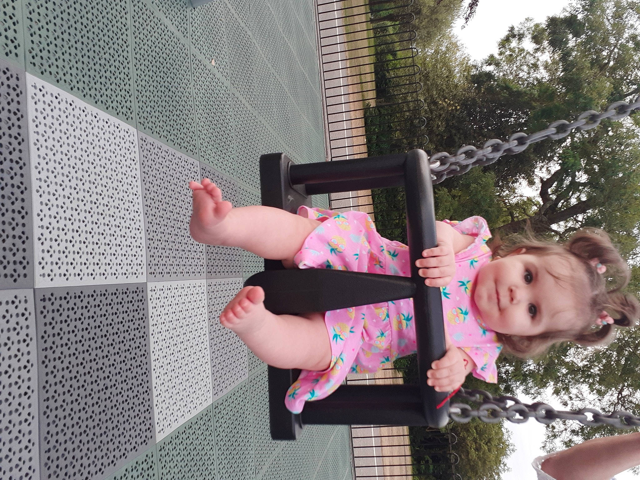 Annabella is registered to the contest to win money with this photo: arm, child, happy, leg, leisure, person, pink, play, thigh, toddler, tree, vacation