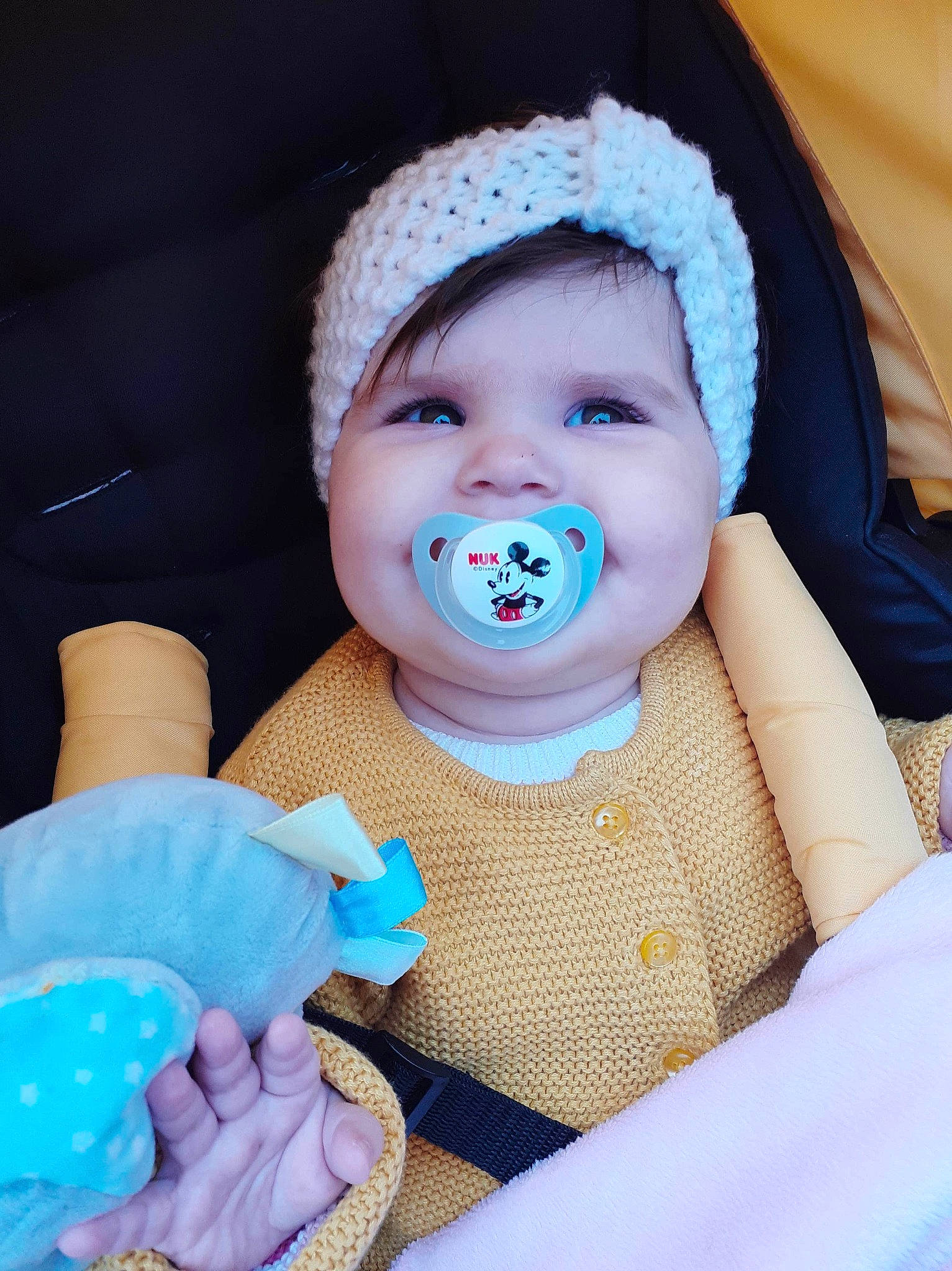 Annabella is registered to the contest to win money with this photo: baby, baby_products, baby_sleeping, baby_toddler_clothing, birth, blue, cheek, child, happy, headgear, headwear, mouth, person, pink, product, skin, smile, toddler