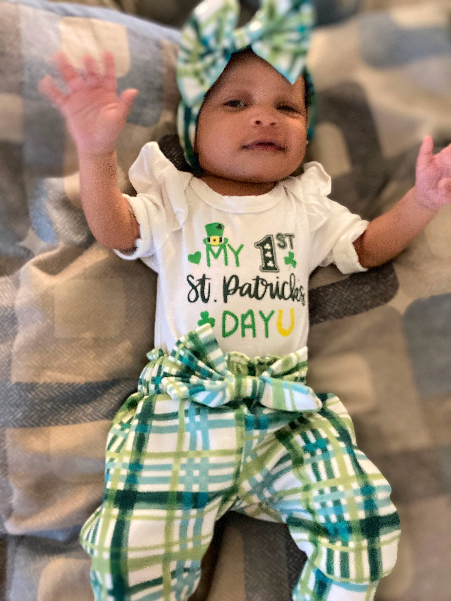 Alexis joined the competition — help win amazing prizes! baby, baby_toddler_clothing, cap, child, face, fun, gesture, green, hand, happy, hat, headwear, leisure, pattern, people, person, play, sleeve, smile, t_shirt