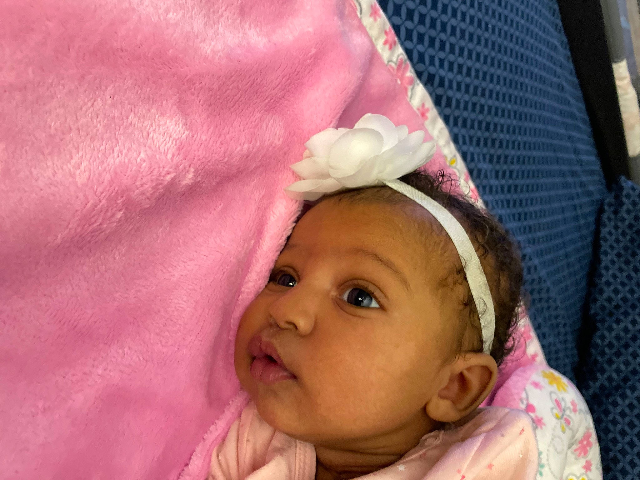 Yelena is registered to the contest to win money with this photo: baby, baby_products, baby_toddler_clothing, cheek, child, close_up, comfort, eyelash, fashion_accessory, hair_accessory, happy, linens, lip, magenta, person, pink, skin, sleeve, smile, textile