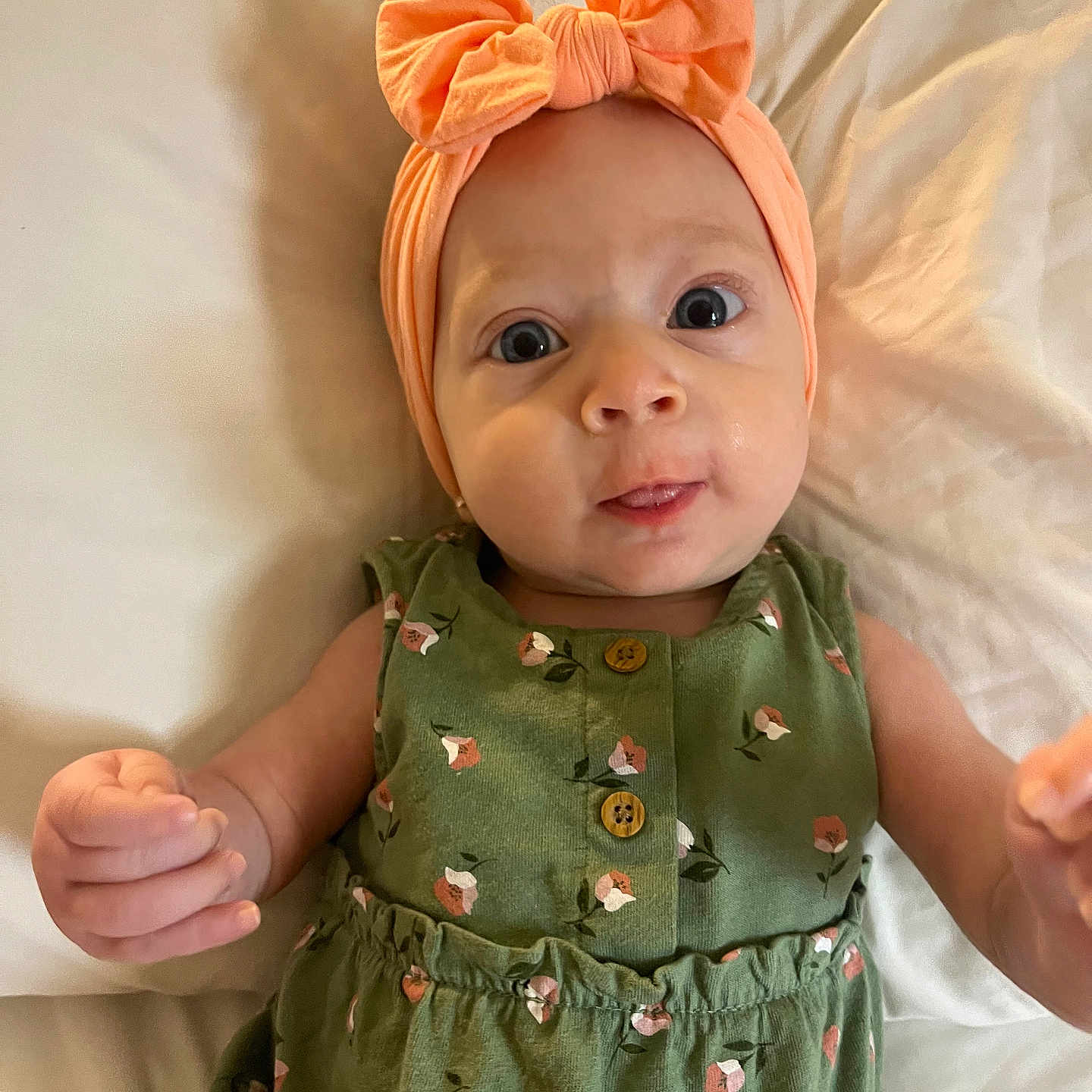 Jazzlynn is registered to the contest to win money with this photo: accessories, baby, bodypart, bonnet, cap, clothing, couch, dress, face, finger, hand, happy, hat, head, headband, newborn, person, photography, portrait, smile