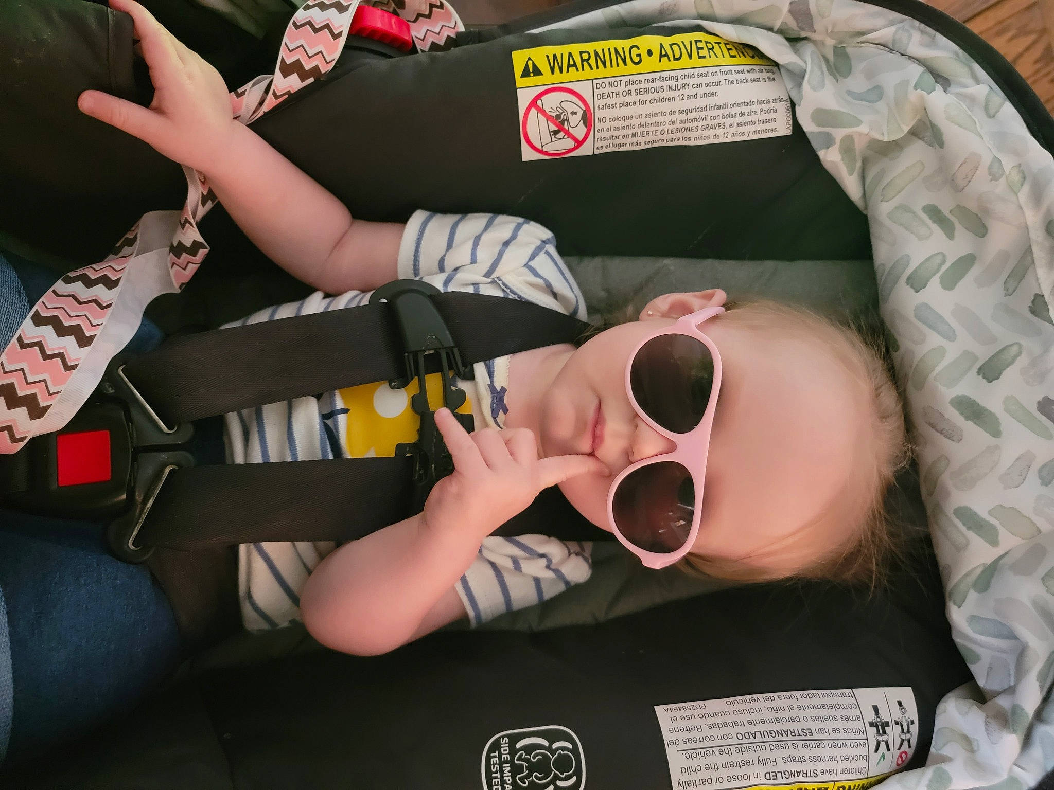 Ellianna joined the competition — help win amazing prizes! baby, baby_products, baby_toddler_clothing, car_seat, child, comfort, eyelash, eyewear, fashion_accessory, finger, font, fun, nail, pattern, person, personal_protective_equipment, room, sunglasses, thigh, toddler
