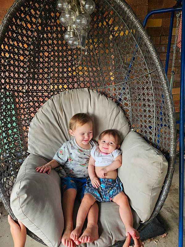 Portia joined the competition — help win amazing prizes! arch, baby, blue, child, circle, comfort, event, foot, fun, grass, joy, lap, leisure, person, recreation, room, sandal, shorts, sitting, t_shirt