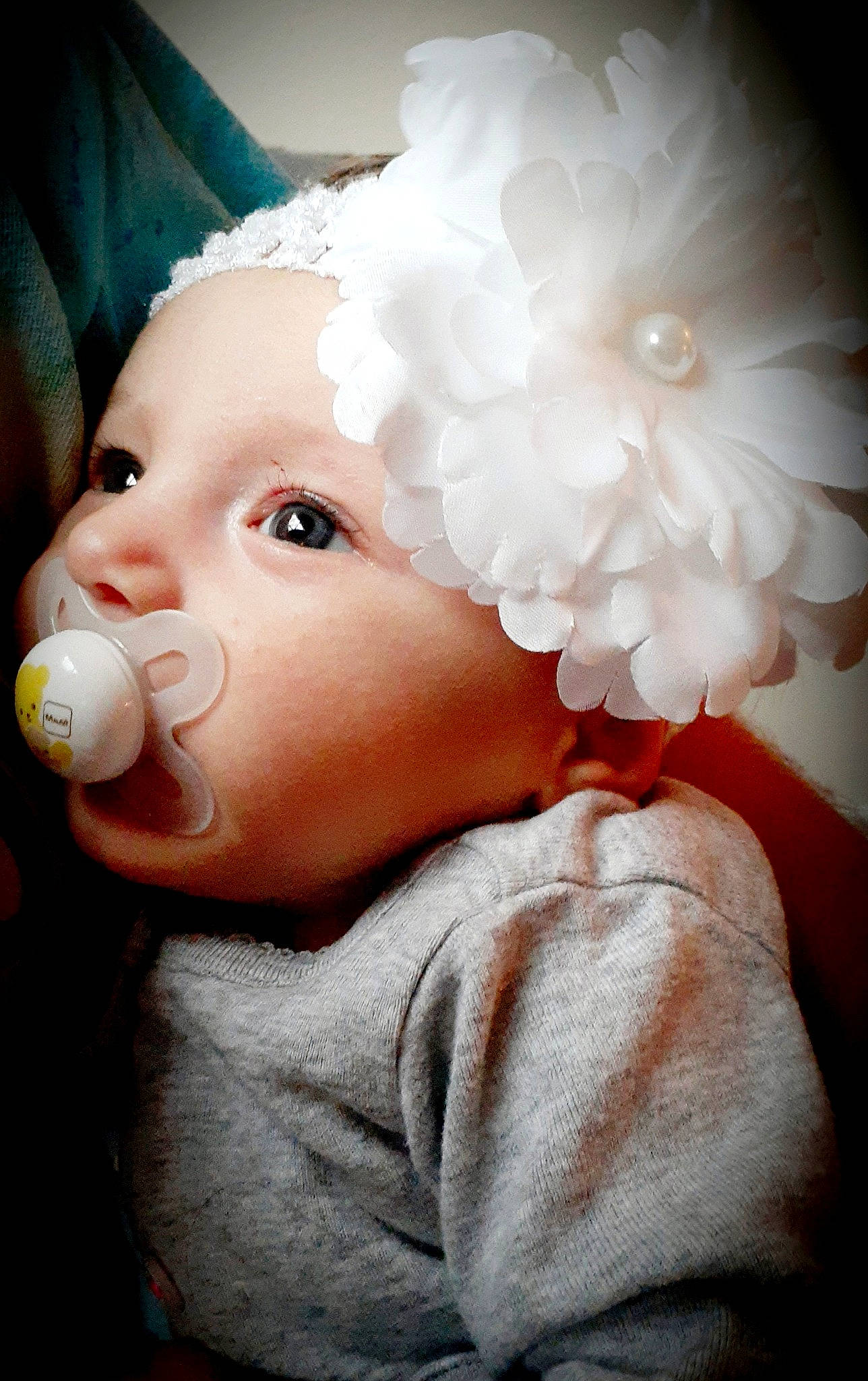 Laura is registered to the contest to win money with this photo: baby, cheek, child, ear, headwear, lip, mouth, nose, person, smile, toddler