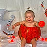 Guiliana participe au concours pour gagner de l'argent avec cette photo : autumn_decor, baby, blanket, costume, cute, fall_flowers, ghost_balloon, happy, hedgehog_figurine, holiday_photo, hollow_pumpkin, infant, orange_ball, portrait, props, pumpkin, smiling, string_lights, studio_backdrop, vase