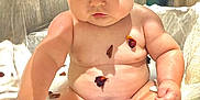 Guiliana participe au concours pour gagner de l'argent avec cette photo : baby, bath, bathroom, bow, bubble_bath, child, chubby, cute, face, flower_petals, hands, headband, indoors, milky_water, playful, portrait, relaxation, sitting, skin, water