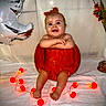 autumn, baby, balloon, blanket, bow, decor, feet, happy, headband, indoor, infant, legs, orange_lights, portrait, pumpkin, seasonal, silver_balloon, smile, string_lights, white_towel