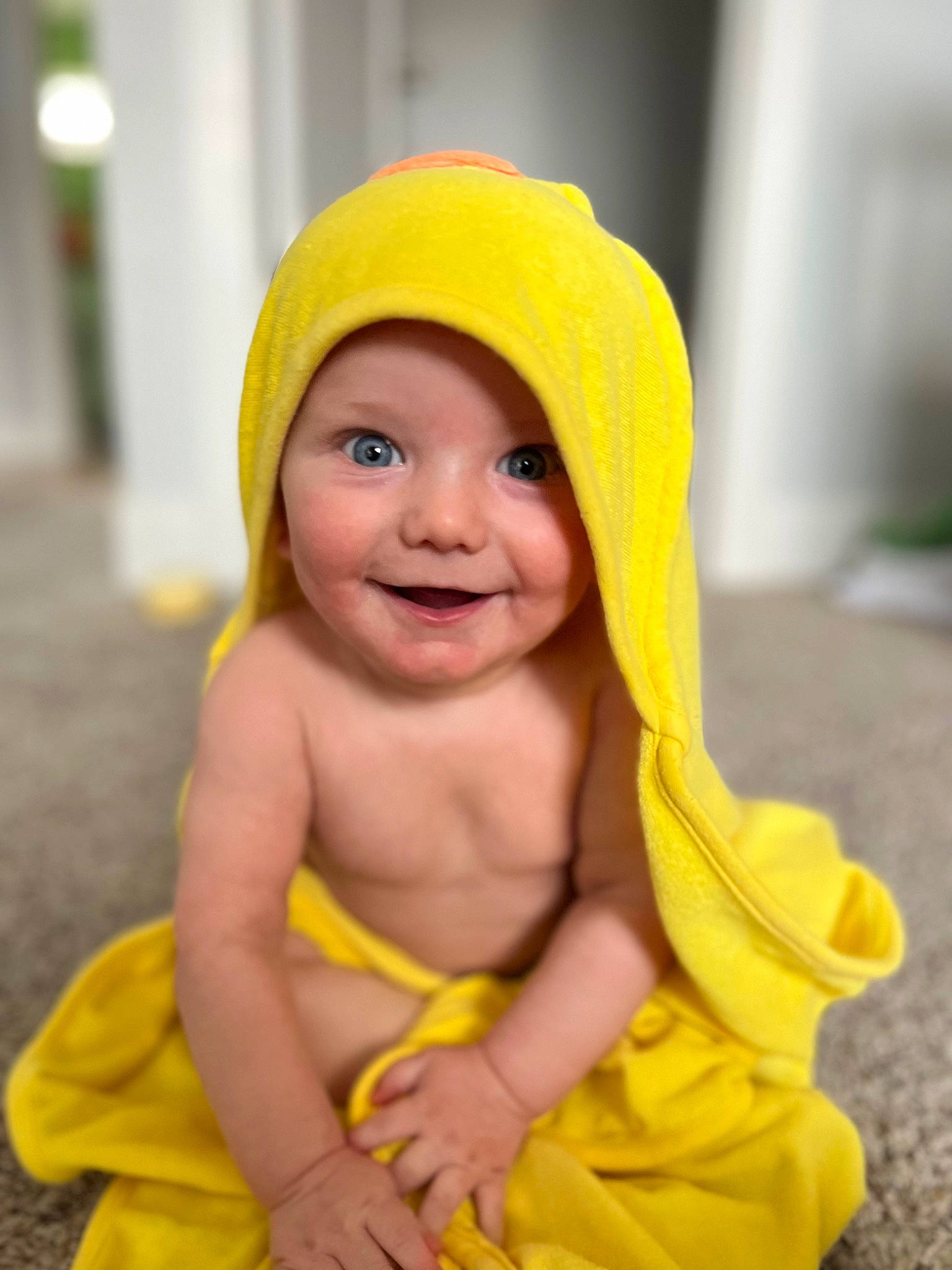 London is registered to the contest to win money with this photo: baby, cap, child, costume, costume_hat, eye, face, fashion_accessory, fictional_character, fun, happy, hat, headwear, joy, magenta, orange, peach, person, portrait_photography, recreation