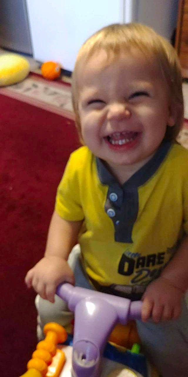 Wade joined the competition — help win amazing prizes! baby, baby_laughing, cheek, child, facial_expression, fun, happy, joy, laugh, mouth, person, play, sitting, skin, smile, toddler, yellow