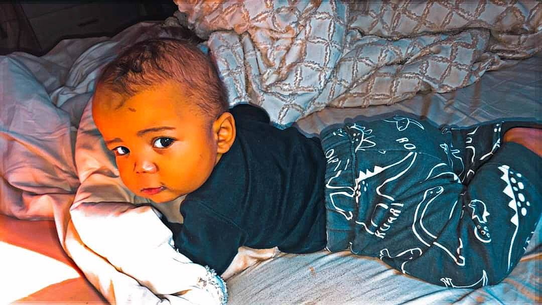 Tyrone joined the competition — help win amazing prizes! baby, child, comfort, couch, eye, flash_photography, fun, grass, happy, human_body, iris, leisure, linens, pattern, person, room, sitting, smile, t_shirt, toddler