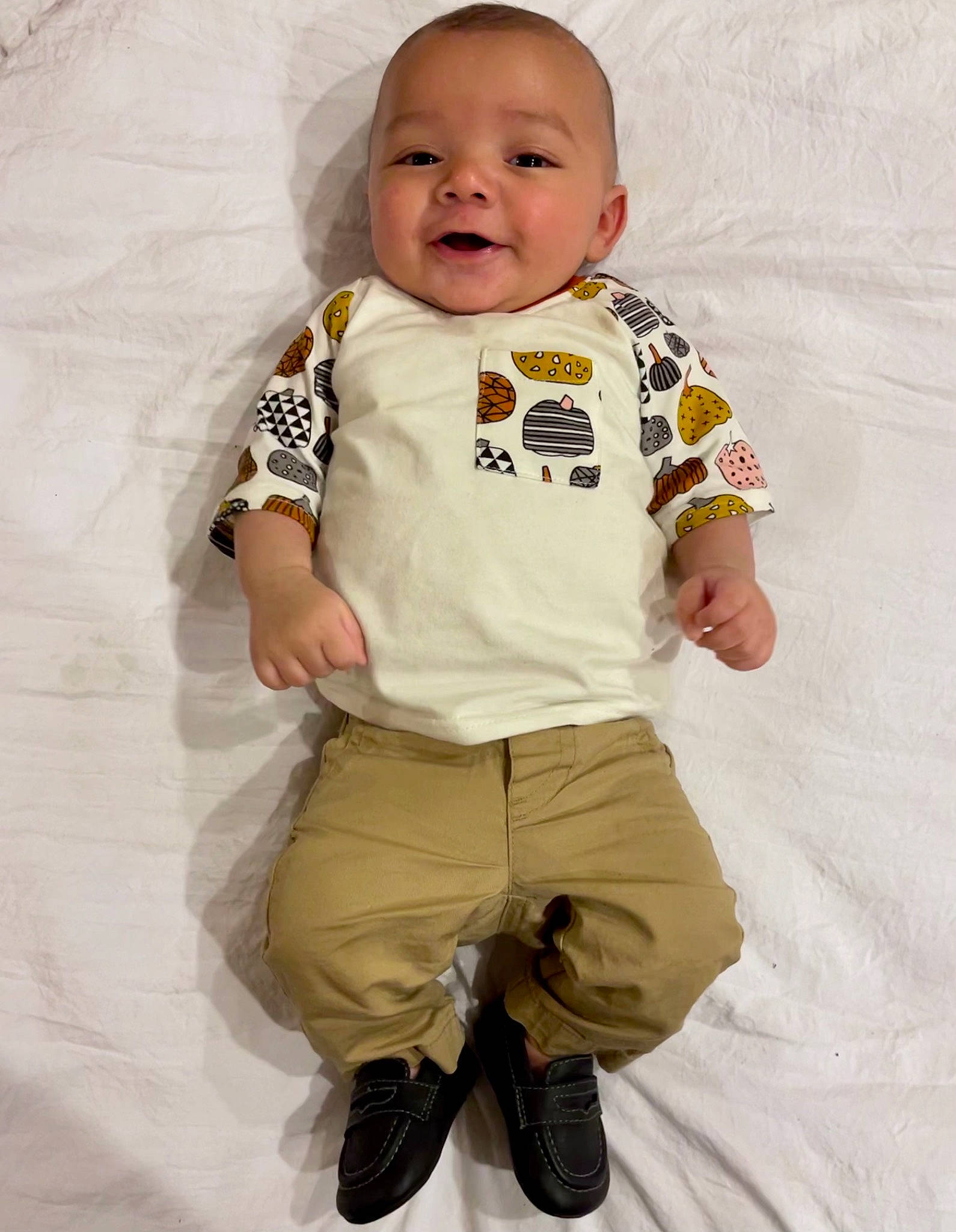 Luciano joined the competition — help win amazing prizes! arm, baby, baby_toddler_clothing, collar, eye, face, gesture, happy, head, khaki_pants, leg, pattern, person, pink, product, skin, sleeve, smile, t_shirt, textile
