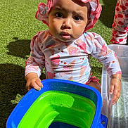 Olivia joined the competition — help win amazing prizes! toddler, child, baby, bucket, water, sunhat, outdoor, grass, playtime, summer, toy, colorful, cute, expression, hand, sitting, clothing, daylight, skin, person
