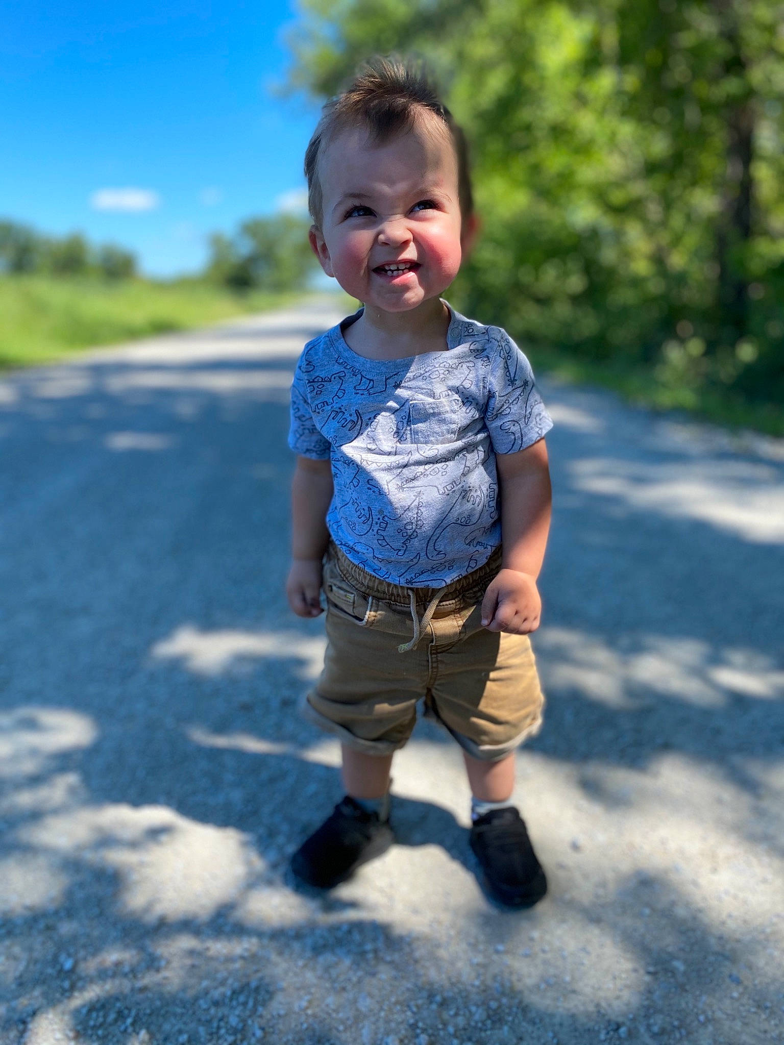 John Michael joined the competition — help win amazing prizes! blue, child, cool, denim, fun, grass, jeans, joy, person, photography, play, recreation, shorts, sleeve, smile, standing, summer, t_shirt, toddler, tree
