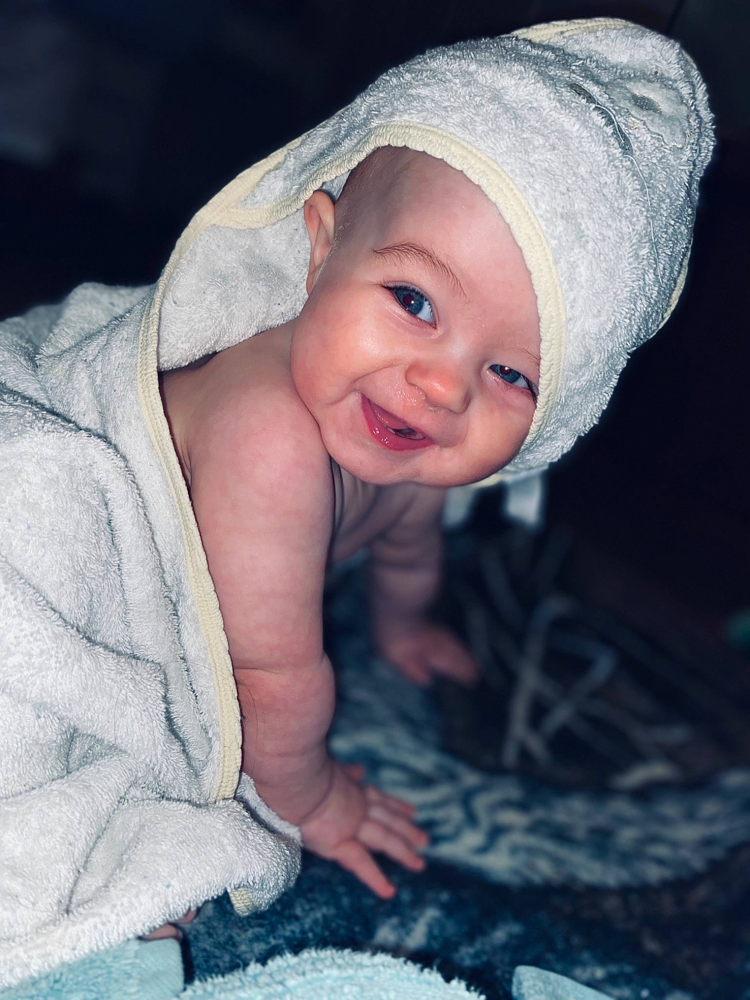 Legend is registered to the contest to win money with this photo: baby, beanie, cap, child, darkness, eye, fashion_accessory, flash_photography, fun, fur, grass, happy, hat, headwear, iris, joy, laugh, lip, person, portrait_photography
