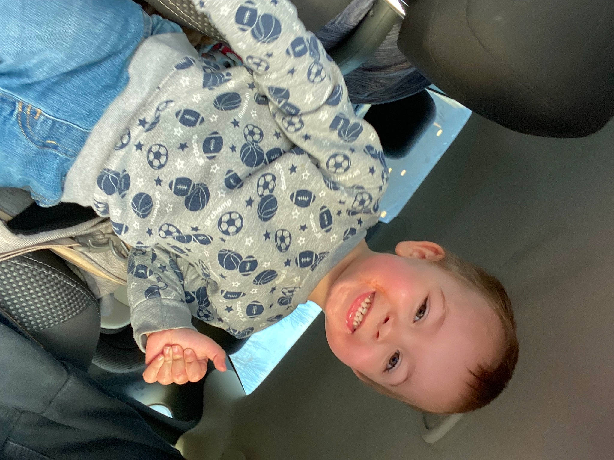 John Michael joined the competition — help win amazing prizes! car_seat, child, comfort, cool, elbow, eyewear, finger, gesture, hand, happy, joint, joy, person, shoulder, sitting, sleeve, smile, sunglasses, thumb, toddler