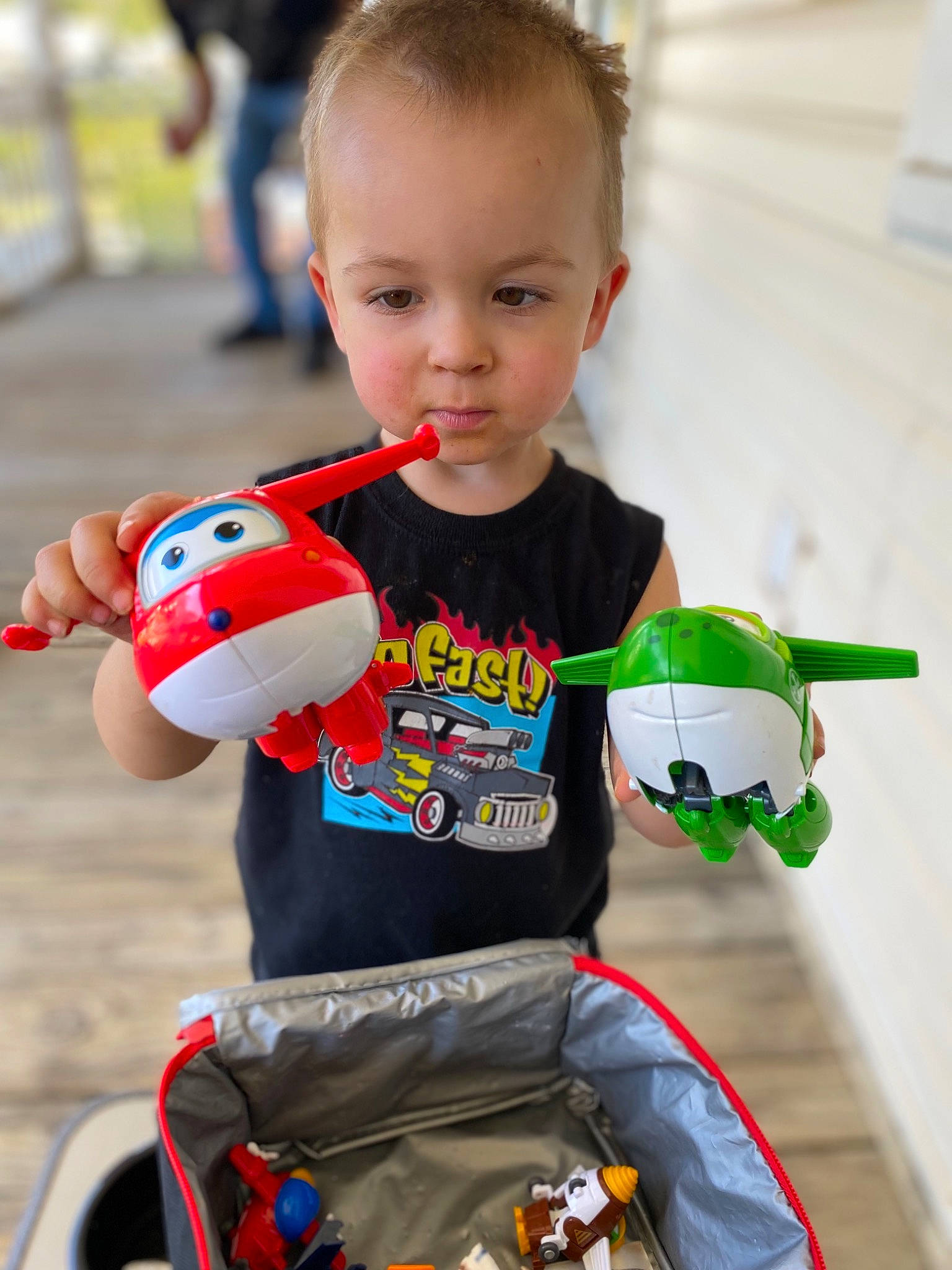 John Michael joined the competition — help win amazing prizes! baby_playing_with_toys, child, cool, drum, fun, green, happy, leisure, mammal, musical_instrument, person, product, recreation, sleeve, t_shirt, toddler, toy, vertebrate, wheel, white