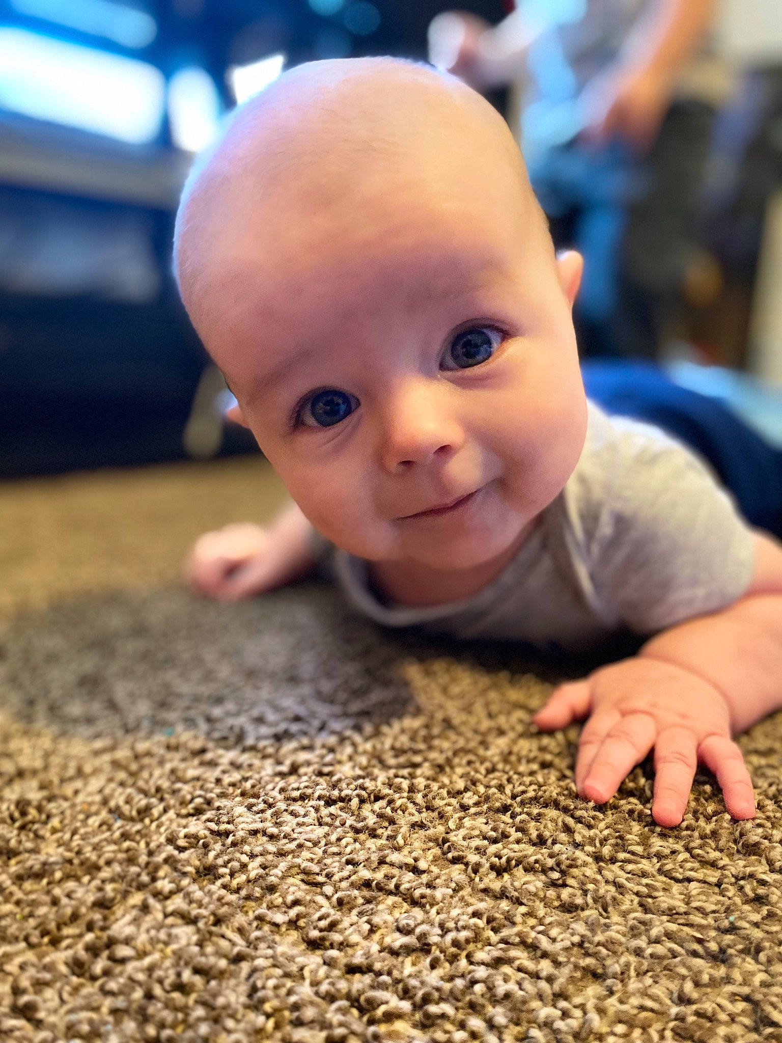 Legend joined the competition — help win amazing prizes! baby, carpet, cheek, child, close_up, comfort, crawling, facial_expression, finger, floor, flooring, fun, hardwood, mouth, nose, person, room, skin, toddler, vertebrate