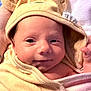Kaia is registered to the contest to win money with this photo: baby, infant, towel, hooded_towel, bear_ears, cute, smile, face, skin, hand, person, newborn, soft, cozy, closeup, portrait, child, warm, fabric, wrap