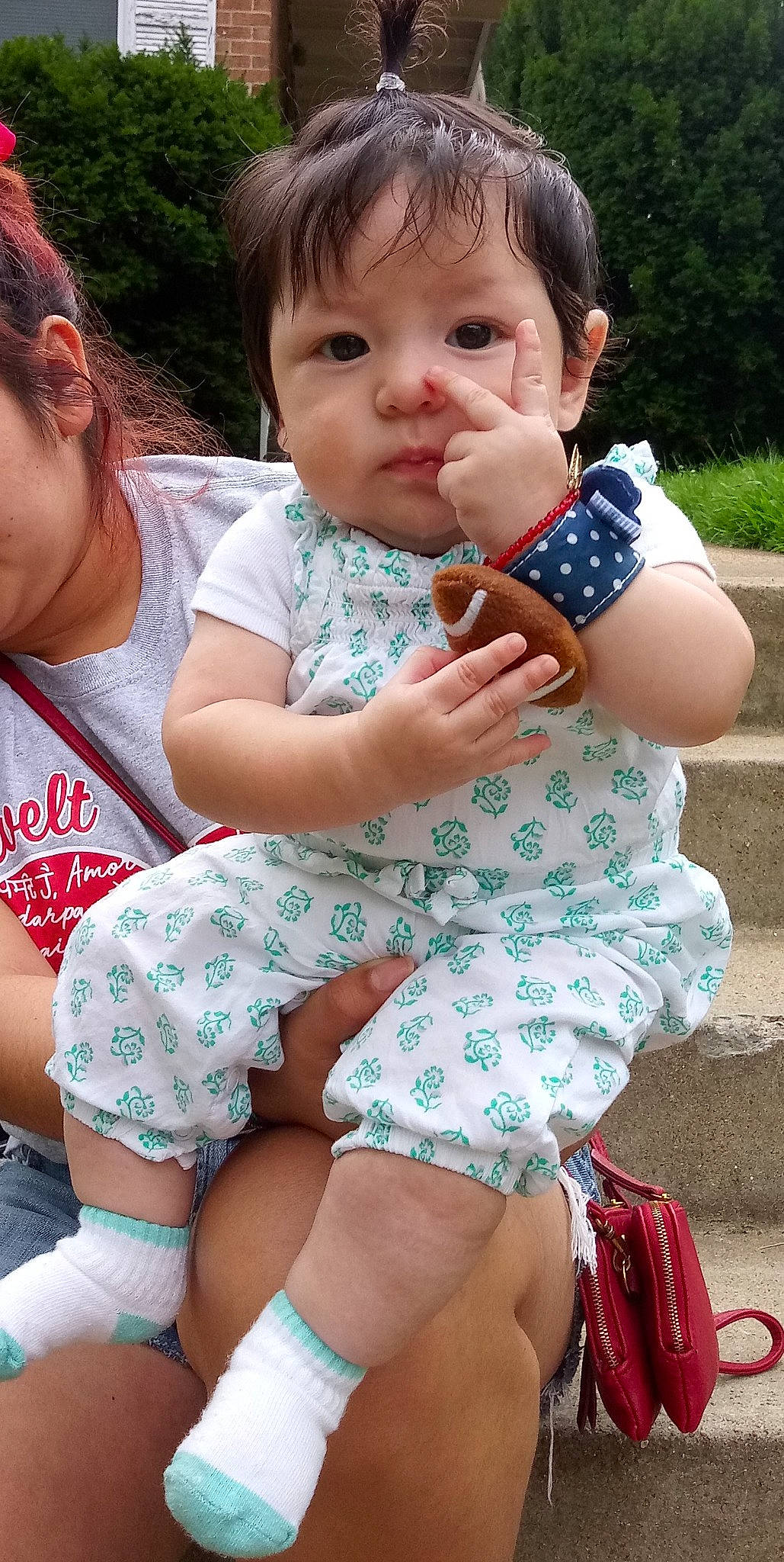 Aileen is registered to the contest to win money with this photo: baby, child, daughter, finger, leg, pattern, person, play, sitting, thigh, toddler