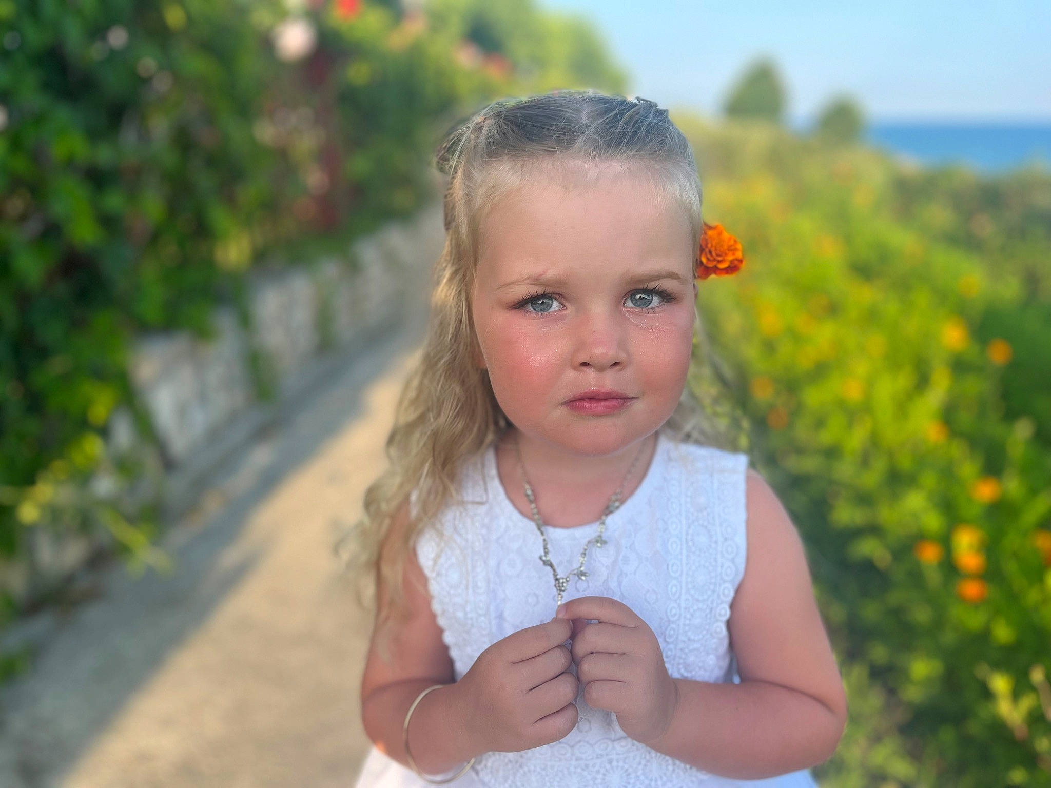 Sofia is registered to the contest to win money with this photo: baby, baby_toddler_clothing, beauty, child, dress, face, flash_photography, flower, fun, grass, happy, iris, people, people_in_nature, person, plant, skin, sky, summer, toddler