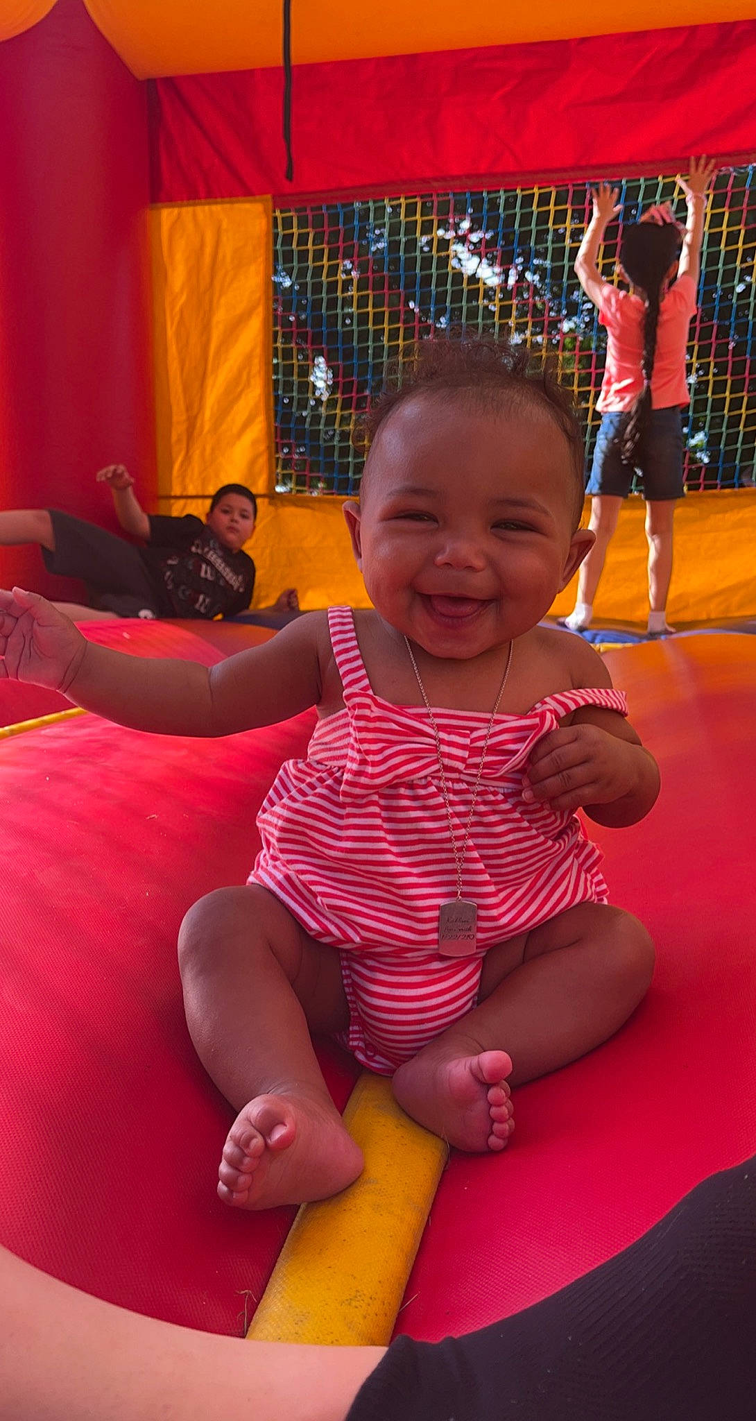 Kahlani is registered to the contest to win money with this photo: child, curtain, entertainment, event, flooring, fun, happy, head, joy, leisure, magenta, people, person, pink, purple, recreation, red, skin, smile, snapshot