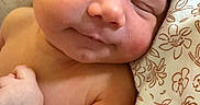 Taytum joined the competition — help win amazing prizes! baby, infant, sleeping, closeup, face, skin, hand, pillow, floral, pattern, peaceful, resting, newborn, cute, portrait, soft_light, indoors, child, relaxed, toddler