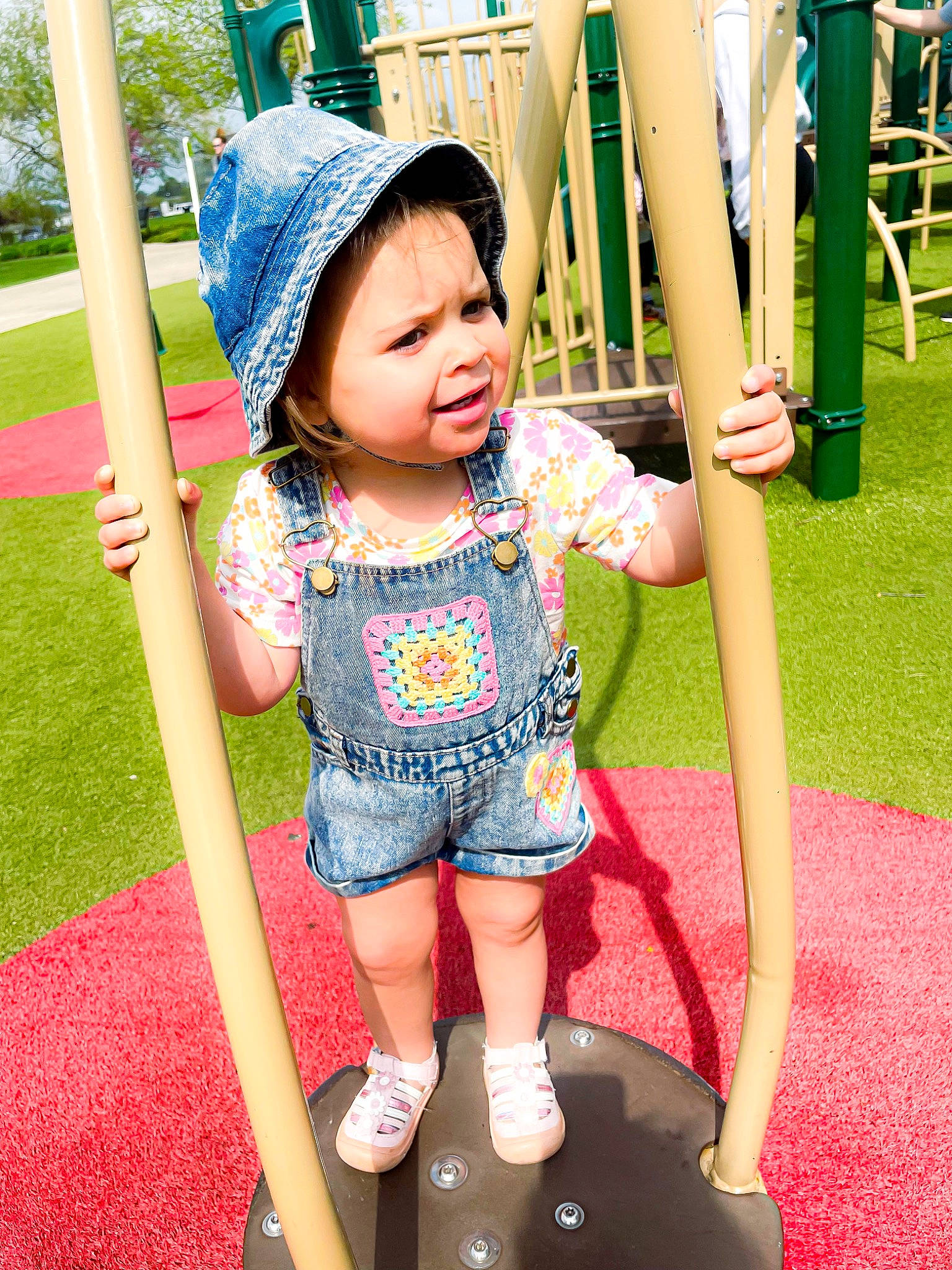 Oakleigh is registered to the contest to win money with this photo: baby, baby_toddler_clothing, child, city, fun, grass, green, happy, headwear, leisure, person, photograph, pink, plant, playground, public_space, recreation, shorts, skin, smile