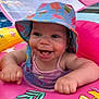 Samarah joined the competition — help win amazing prizes! baby, child, colorful, cute, face, fun, happy, hat, inflatable, outdoor, playful, pool_float, skin, smiling, summer, sunshade, swimsuit, toddler, vacation, water