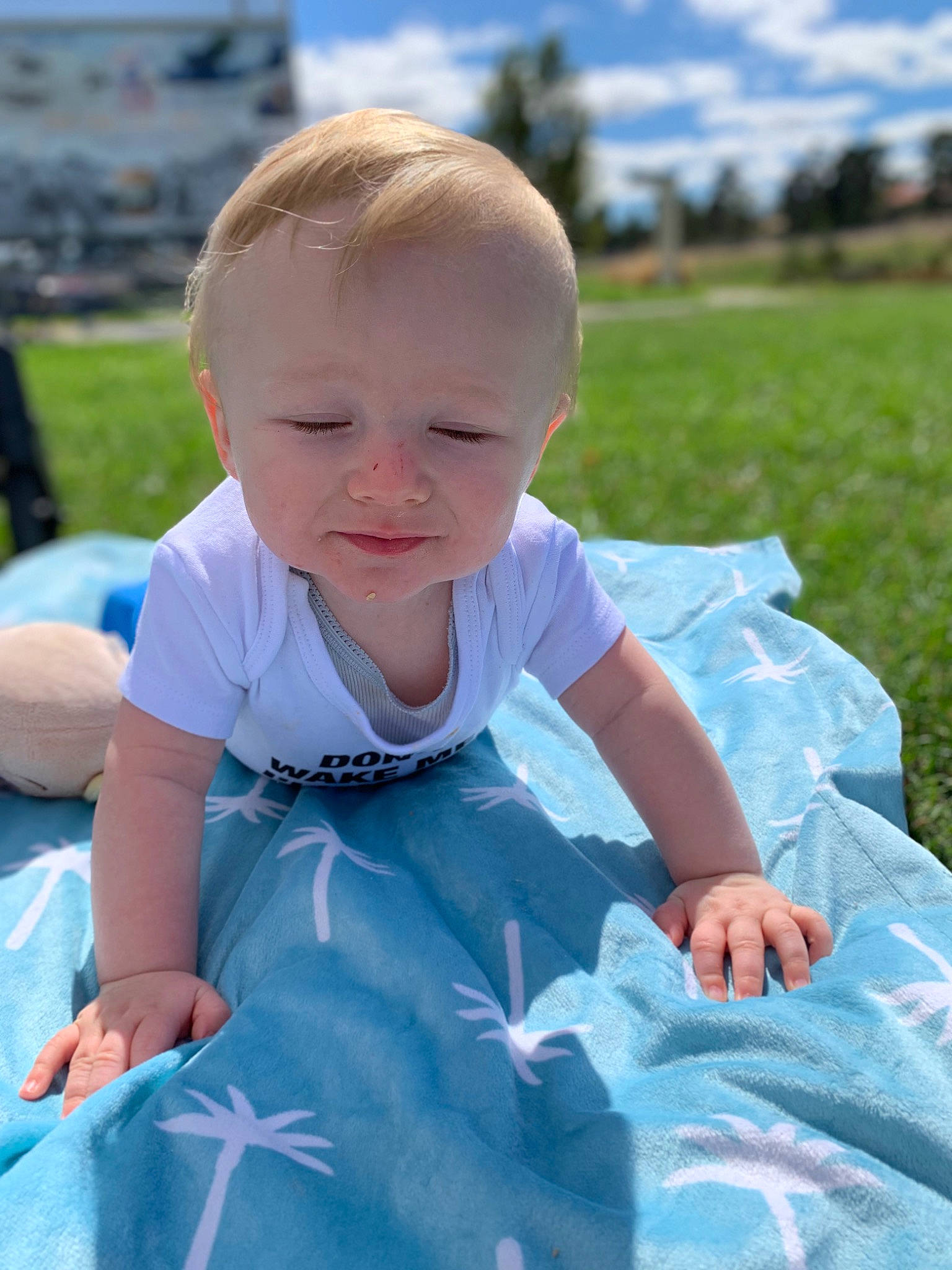 Kaden joined the competition — help win amazing prizes! azure, baby, baby_toddler_clothing, blue, child, cloud, electric_blue, event, fun, grass, happy, leisure, person, plant, recreation, sitting, skin, sky, t_shirt, toddler