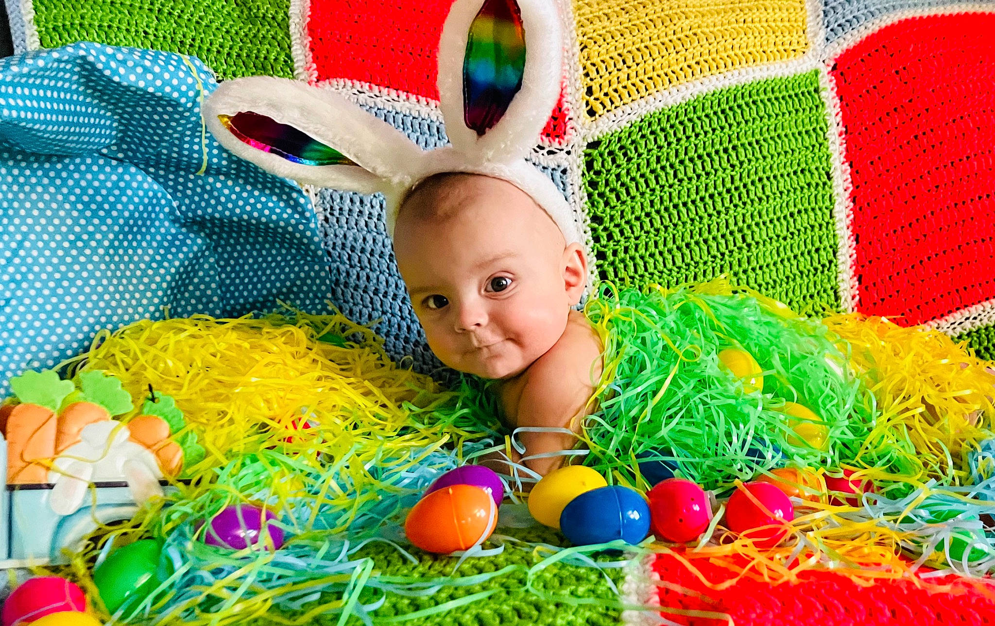Dayton is registered to the contest to win money with this photo: art, baby, baby_toddler_clothing, basket, child, easter, event, fun, grass, green, happy, holiday, leisure, magenta, party_supply, people_in_nature, person, play, sweetness, textile