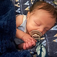 Yésiah joined the competition — help win amazing prizes! baby, sleeping, pacifier, blanket, blue, cozy, infant, closeup, soft, hand, cute, resting, peaceful, child, portrait, indoors, comfort, warmth, fabric, nursery
