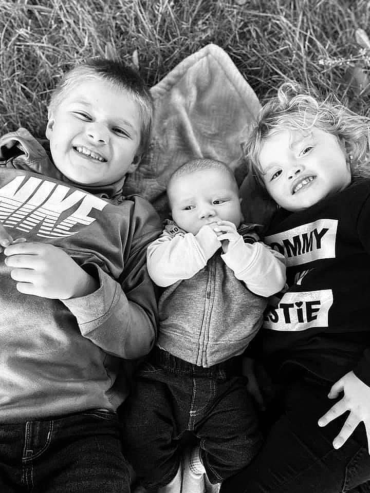 Aaron is registered to the contest to win money with this photo: baby, black_and_white, child, family, fun, grass, happy, joy, laugh, monochrome, monochrome_photography, people, person, photograph, photography, portrait, portrait_photography, sibling, smile, snapshot